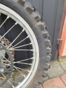 КОЛЕСО ЗАД 19 ДИСКОМ ШЕСТЕРНЯ OS 25 MM HONDA CRF CR 125 / 250 / 450  (18809246700) фото min 10