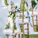 Оформление свадебного стула листьями и лентами