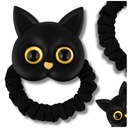 Эластичная резинка для шерсти черной кошки.