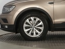 VW Tiguan 1.4 TSI, Salon Polska, Klima Wyposażenie - komfort Wspomaganie kierownicy Podgrzewane przednie siedzenia Elektryczne szyby przednie Elektrycznie ustawiane lusterka Wielofunkcyjna kierownica Elektryczne szyby tylne