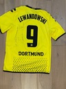 Koszulka z autografem Lewandowskiego + buty Postać Robert Lewandowski