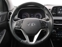 Hyundai Tucson 1.6 GDI, Salon Polska Wyposażenie - komfort Wielofunkcyjna kierownica Elektrycznie ustawiane lusterka Elektryczne szyby tylne Elektryczne szyby przednie Wspomaganie kierownicy Przyciemniane szyby Podgrzewane przednie siedzenia