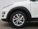 Hyundai Tucson 1.6 GDI, Salon Polska Wyposażenie - bezpieczeństwo ESP (stabilizacja toru jazdy) Poduszka powietrzna chroniąca kolana Isofix Poduszki boczne przednie Czujnik deszczu ASR (kontrola trakcji) Poduszka powietrzna pasażera Alarm ABS Poduszka powietrzna kierowcy