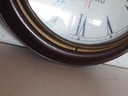 Деревянные часы, украшенные оксфордской латунью.