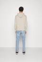 Bluza beżowa z kapturem Calvin Klein Jeans M Kolor beżowy
