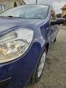 Renault Clio 1.2i Wyposażenie - komfort Elektryczne szyby przednie Przyciemniane szyby Wielofunkcyjna kierownica Wspomaganie kierownicy