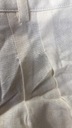 Plátené ecrue nohavice zvýšený stav defekt 34 Dominujúci vzor bez vzoru