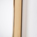 Золотое подвесное прямоугольное настенное зеркало в золотой металлической раме, 55х45 см.