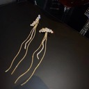 Женские длинные золотые серьги-подвески с фианитами