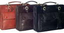Мужской портфель из итальянской кожи черного цвета с 2 большими отделениями.
