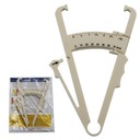 Штангенциркуль бежевого цвета для измерения тканей.