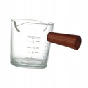 Стеклянный кувшин с мерной чашкой для эспрессо.