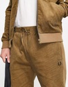 FRED PERRY CORD TAPERED LEG JOGGERS IN TAN PÁNSKE MENŠIE NOHAVICE veľ. M Model CORD TAPERED LEG JOGGERS IN TAN