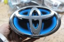 TOYOTA OE EMBLÈME LOGO SUR GRILLE YARIS III LIFT HYBRID 2014-2017 753010D130photo 6
