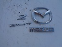 ЭМБЛЕМА КРЫШКИ БАГАЖНИКА ЗАДНЕЙ MAZDA 2 II 07-