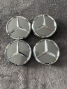 КОВПАЧКИ MERCEDES КОЛІР СІРИЙ СРІБНЕ 75MM  (1089868655) фото min 1