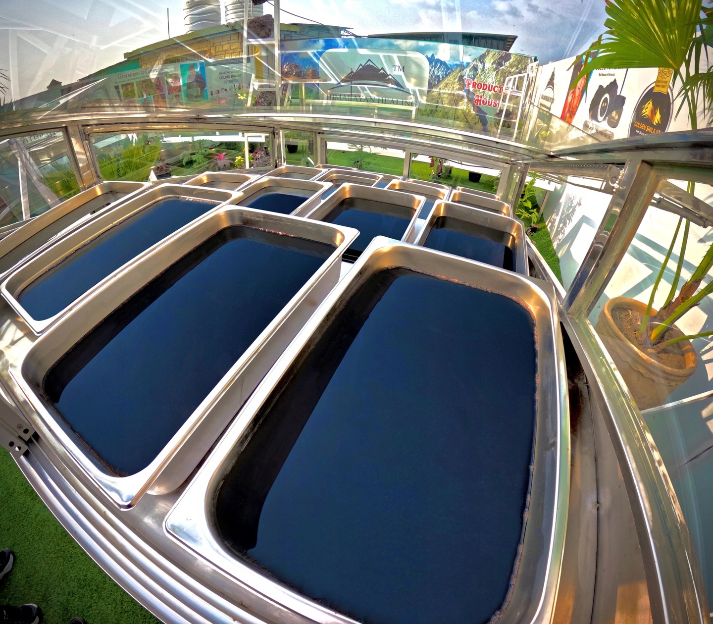 Liquid Shilajit is being poured in glass.