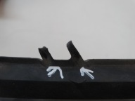 grid of a bumper right front OPEL CORSA D 13211479