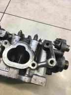 TESTATA sinistra IMPREZA 2.0 16V GC 718546