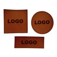 LOGÓS CÍMKÉK SZEMÉLYRE SZABOTT BŐR RUHÁZATI TÁSKÁK HÁTIZSÁKOK CIPŐK 200DB