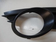 grid of a bumper right front OPEL CORSA D 13211479