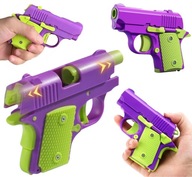 V2 STRZELAJĄCY PISTOLET ZABAWKA ANTYSTRESOWA FIDGET TOY PISTOLECIK FIOLET