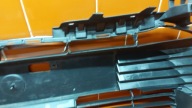 grid of a bumper central front front TOYOTA COROLLA E21 sedan 19