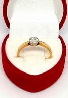 Złoty pierścionek z Brylantem 0,40ct Pr.585 W:2,14gr R.14 zaręczynowy .