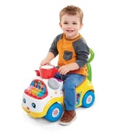 FISHER PRICE Jeździk chodzik żółty Muzyczna Parada 39988