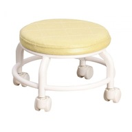 Nízka rolovacia otočná stolička s okrúhlym sedadlom malá žltá