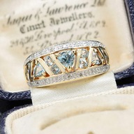 Zlatý prsteň s topásmi a diamantmi obrúčka 9K