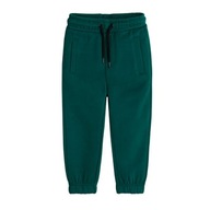 Cool Club Spodnie dresowe chłopięce zielone r 128