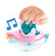 TOMY muzyczne delfinki kąpielowe E6528