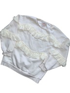 Bluza dziecięca z ozdobną falbanką r. 140-146 cm