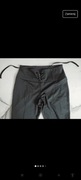 Czarne spodnie Guess z ozdobnym wiązaniem w pasie 