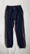 Granatowe spodnie dresowe r.134 endo. eleganckie