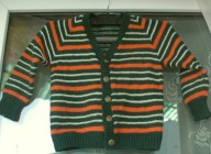 sweterek dzieciecy zapinany zielone pasy 99