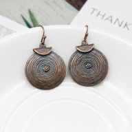 Kolczyki etniczne retro, koło z kwiatkiem