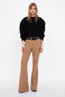 Zara czarny sweter z pomponami M