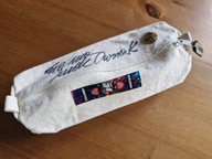 Piórnik z autografem Jurka Owsiaka