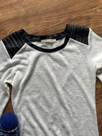 Biała bluzka dzianinowa czarne elementy z ekoskórki