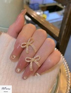 Kol0013 Kolczyki złocone kokardki kamień szlachetny