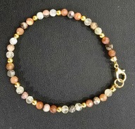 Srebrna bransoletka z naturalnych kamieni i pereł słodkowodnych.