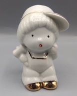 śliczna biało złota dziewczynka w czapeczce, fajna