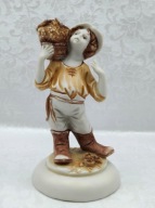 kolekcjonerska OGRODNIK niesie kosz z winogronem