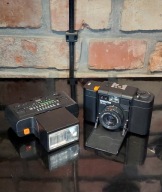 KOLEKCJONERSKI APARAT FOTOGRAFICZNY MINOX 35 ML + LAMPA BŁYSKOWA LATA 80