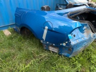 FORD MUSTANG VI 15- BŁOTNIK ĆWIARTKA TYŁ LEWA CABRIO Velocity Blue Metallic