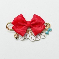 Agrafka do wózka z kokardką 5-6 liter zawieszki