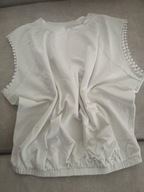 Biała bluzka bez rękawków