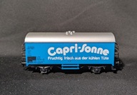 WAGON TOWAROWY ZAMKNIĘTY W TABORZE DB - CAPRI-SONNE - H0 - MARKLIN
